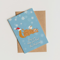 Greeting card with cat playing with snowman's head